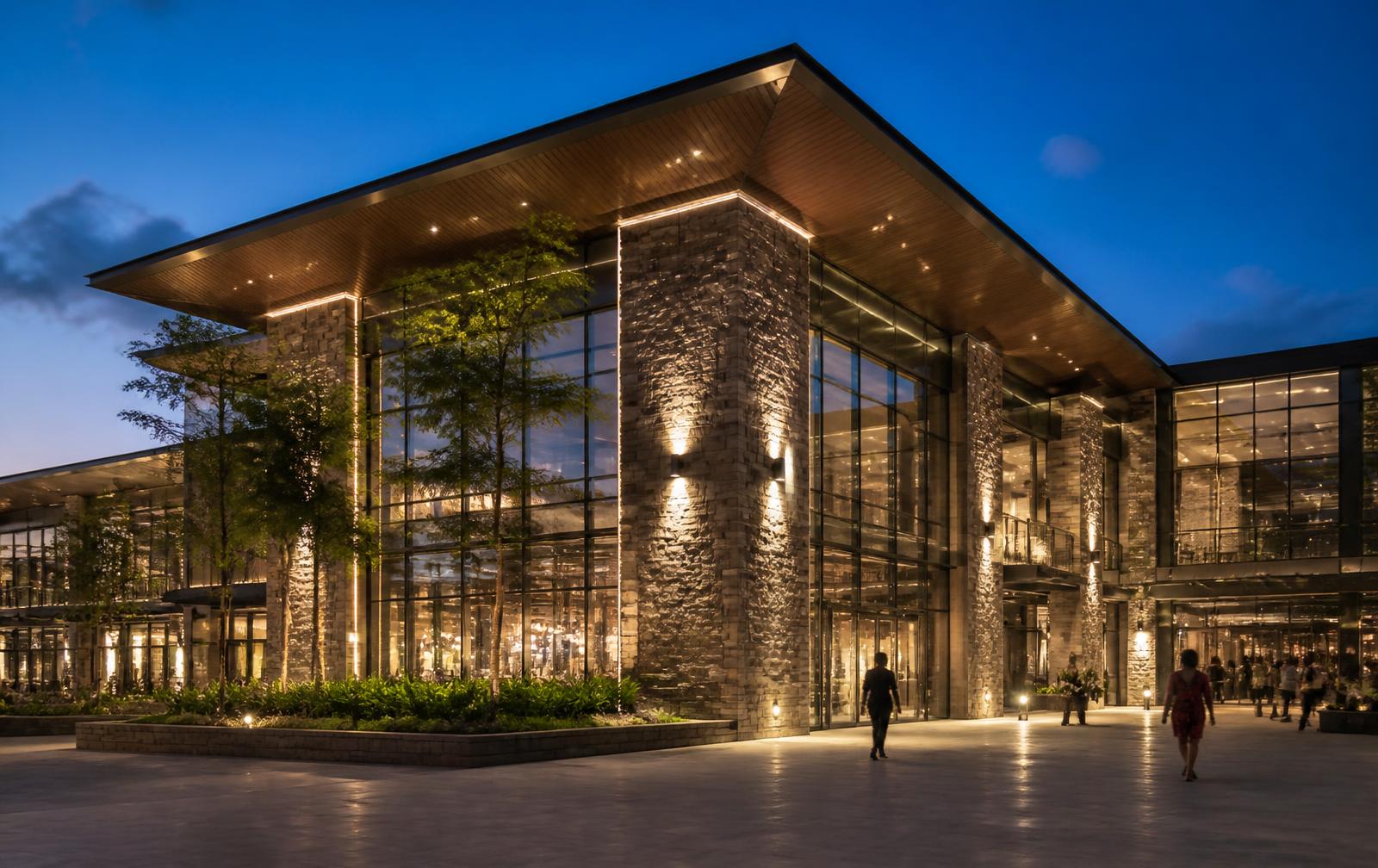 YHONES Market Center modern commercial building at dusk